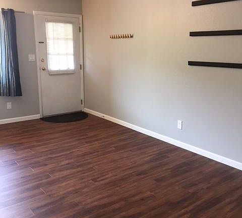 View of front door from inside unit