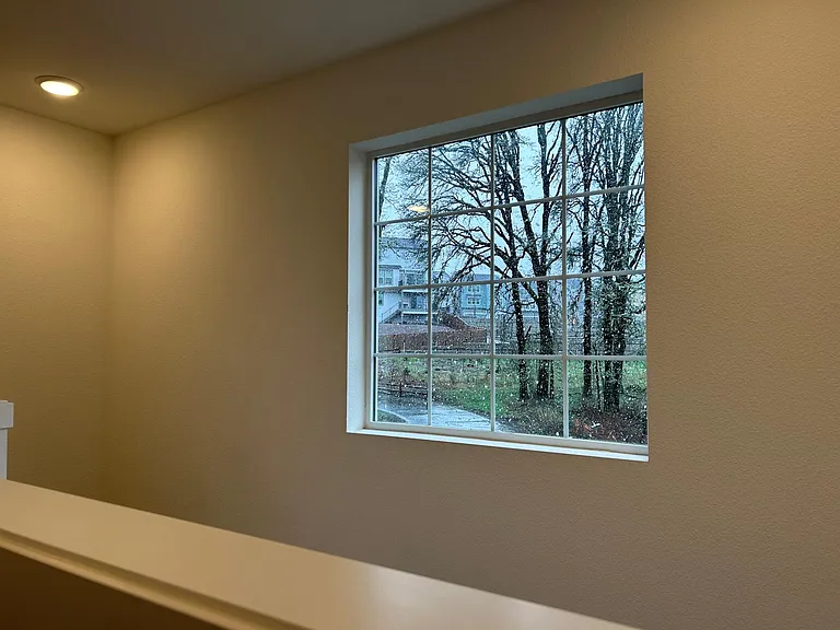 WINDOW ABOVE STAIRCASE
