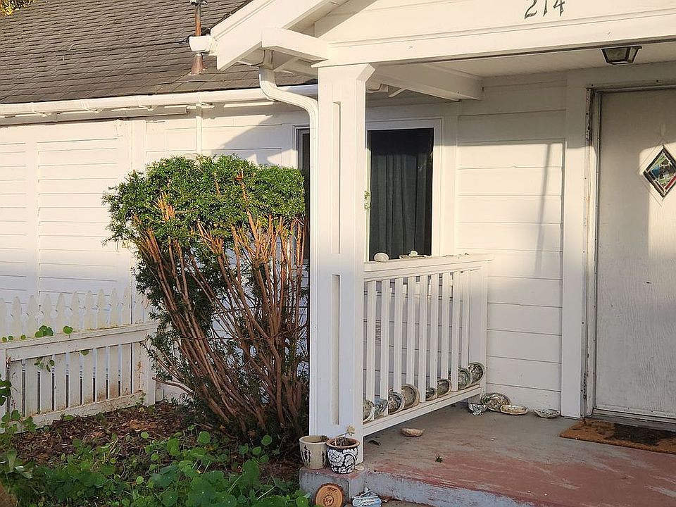 Garage door, front porch. 