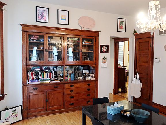 Gorgeous built-ins in the huge dining room give character to this well-preserved classic Chicago apartment