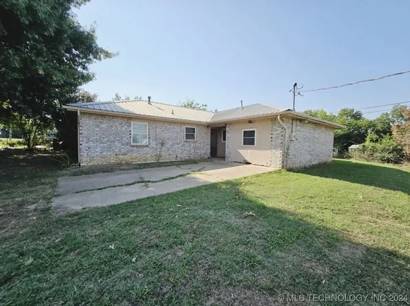110 E Main St, Achille, OK 74720