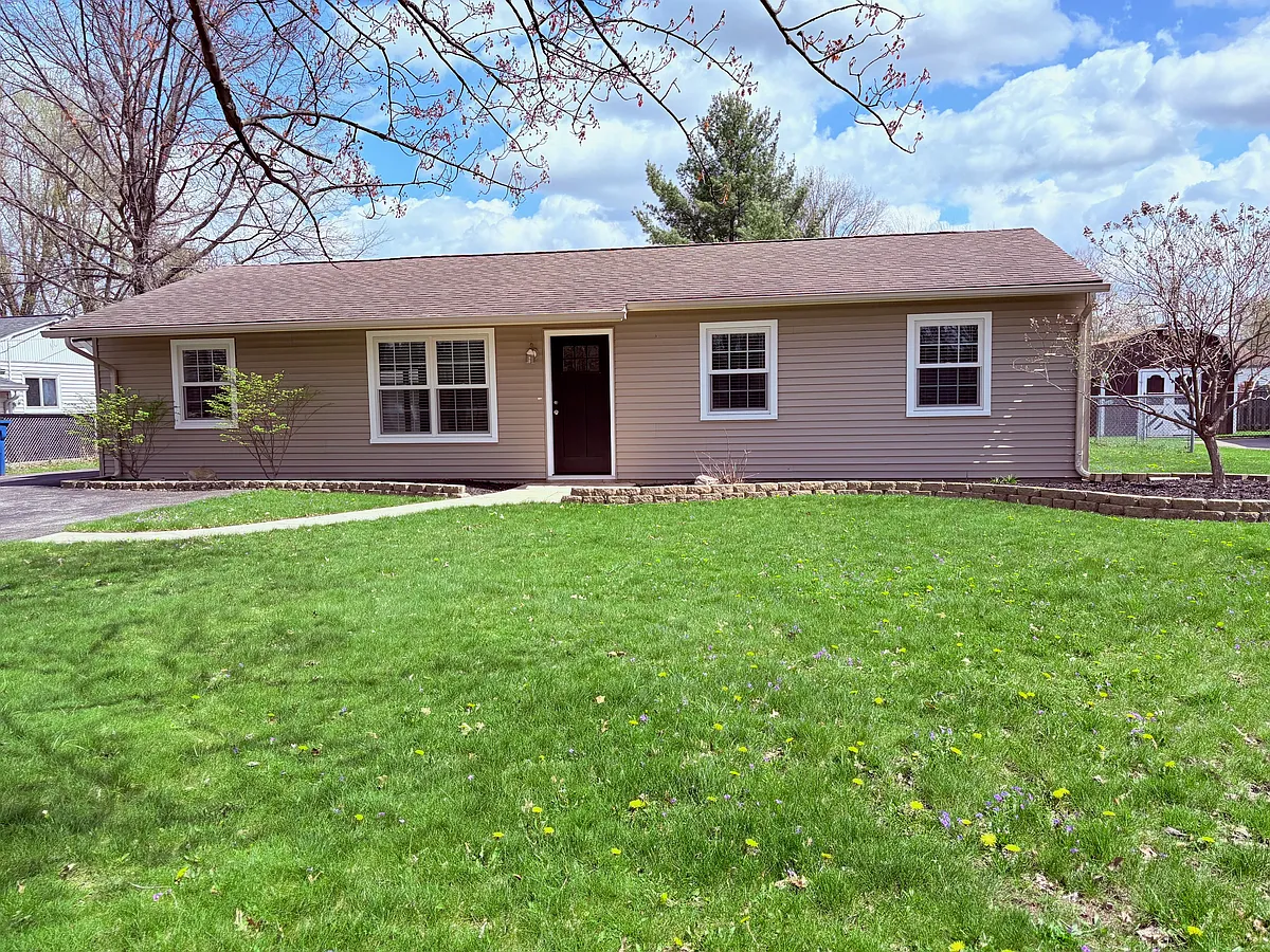 Front of House view 2, new windows, new front and side door, double drive, gated backyard - 7369 Timothy St
