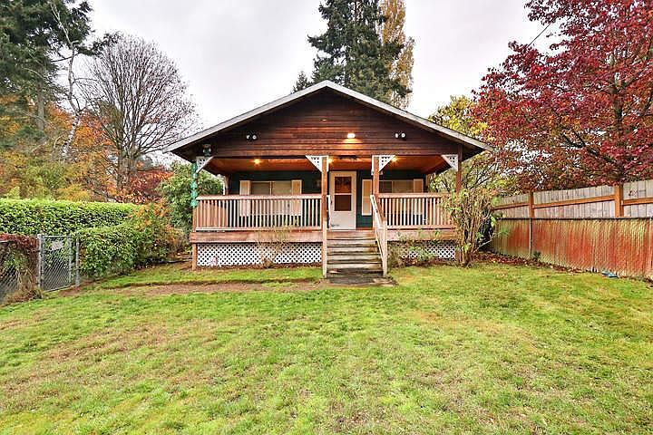 Large fenced front yard