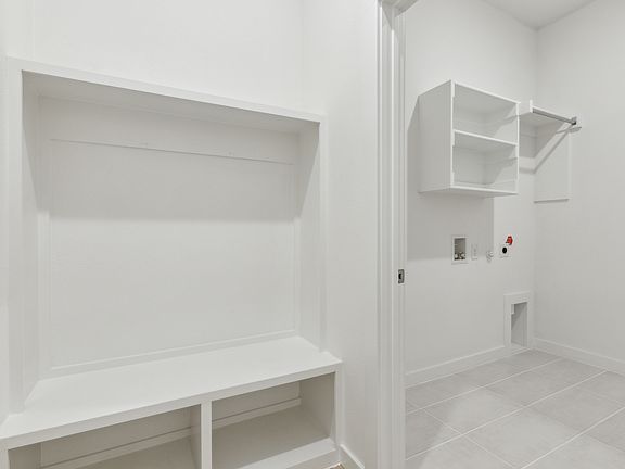 Utility Room in the Gilmour II home plan by Trophy Signature Homes - REPRESENTATIVE PHOTO