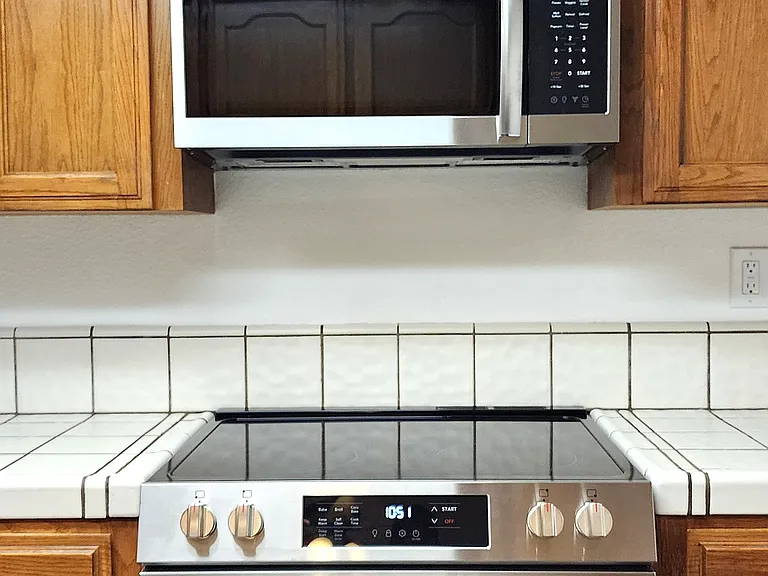 New Stainless Microwave and Range