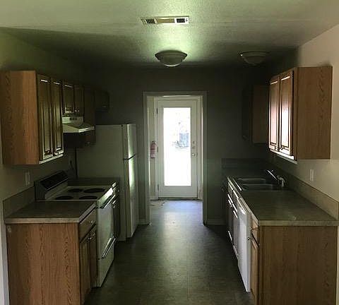 Refrigerator, stove, dishwasher, microwave included, tile fl