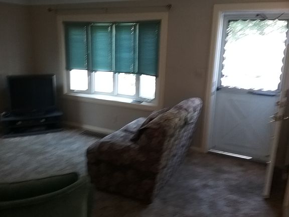 Living room with view of door
