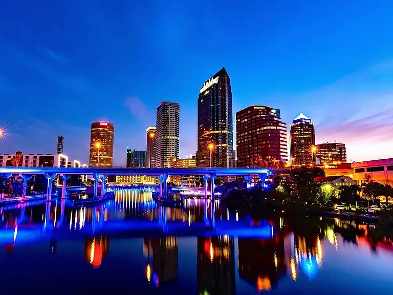 Evening Skyline of Tampa with Vibrant Lights and River Views by Anchor Riverwalk