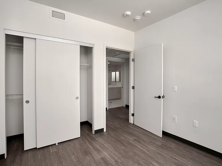 Bedroom C with spacious sliding-door closet and a bright, versatile layout ready to fit your lifestyle.