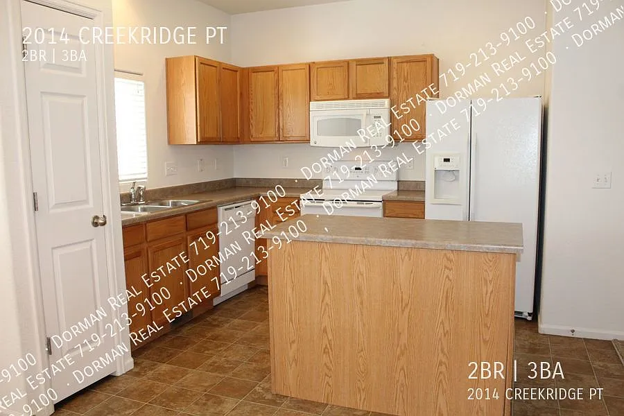 Town Home in The Bluffs at Spring Creek — Photo 2