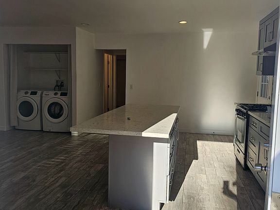 Main Entrance - looking into kitchen and hallway to the bedrooms 1 & 2