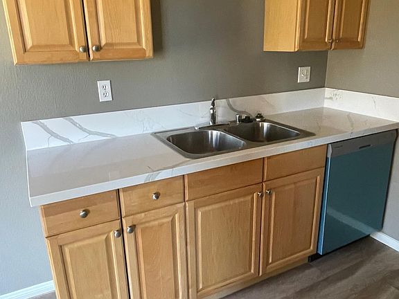 Newer counters and includes a dishwasher