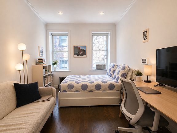 2nd image of 237 E 10th St APT 2C