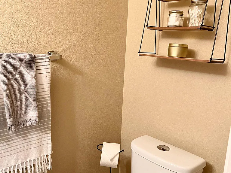 Downstairs powder room, just off the living room, under the stairs