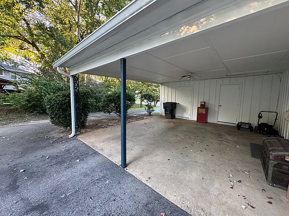 2-vehicle carport with secure storage
