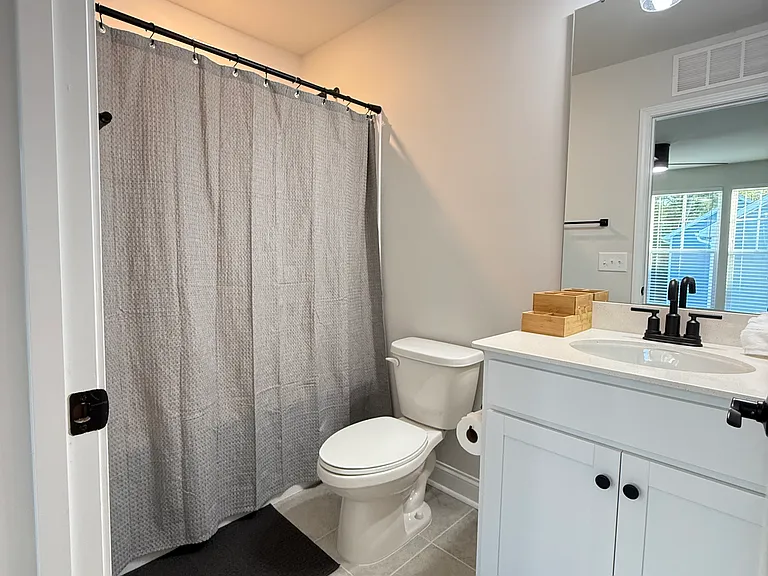 Private en-suite bathroom with a large vanity.
