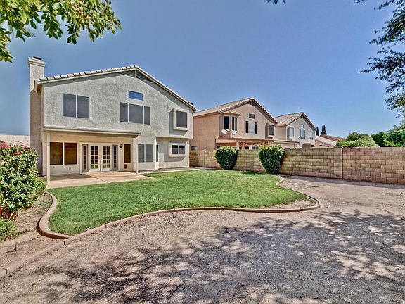 Beautiful Backyard with Green Grass
