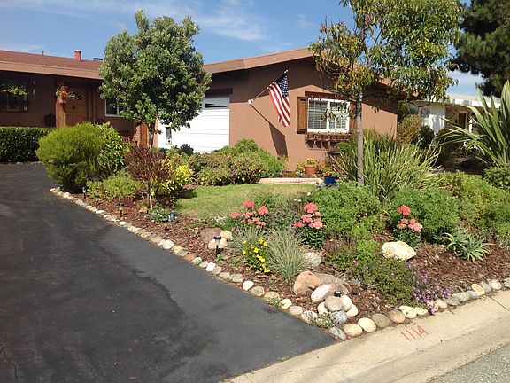 Lovely gardens all around. Tea/coffee on sunny front veranda
