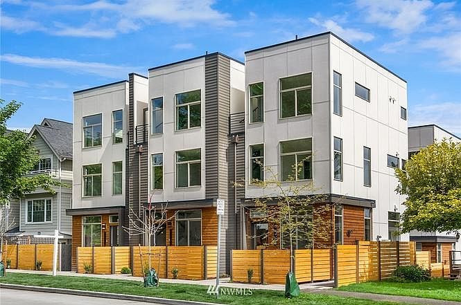 Corner Townhome with gated front garden.