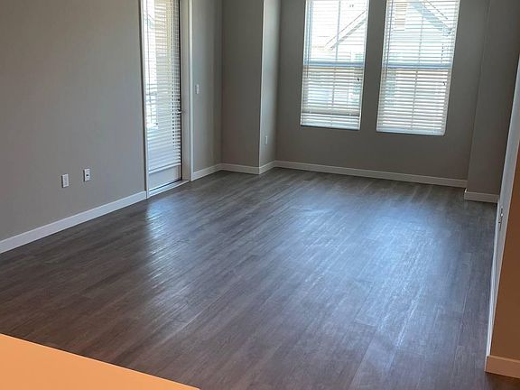 Living room with access to patio