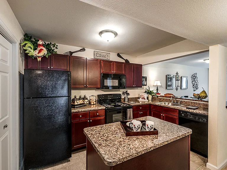 Sizeable kitchen with island and breakfast bar in our 3 bedroom garden apartment