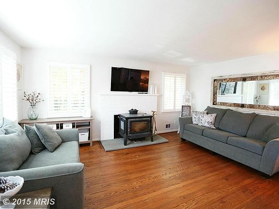 View of Living Room with Wood burning fireplace