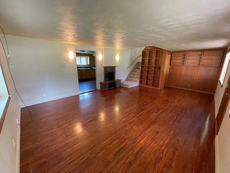 Living area with custom shelving.