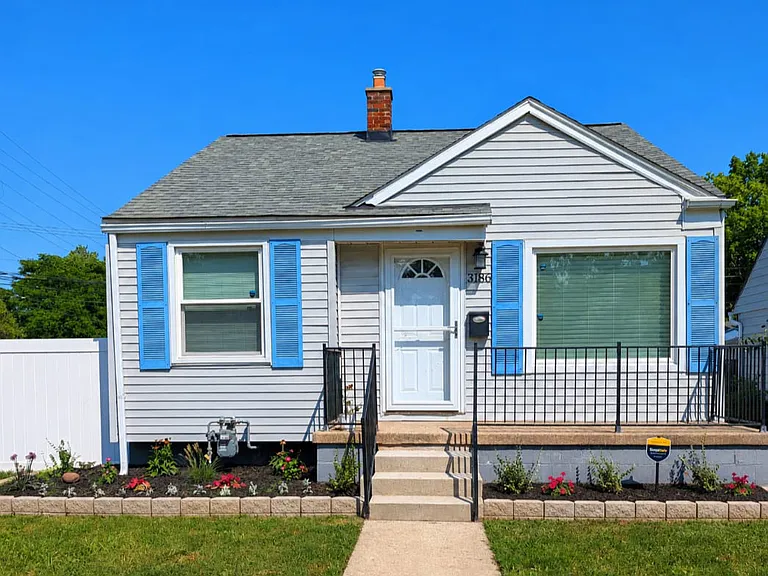 Cute home with new landscaping and beautiful flowers