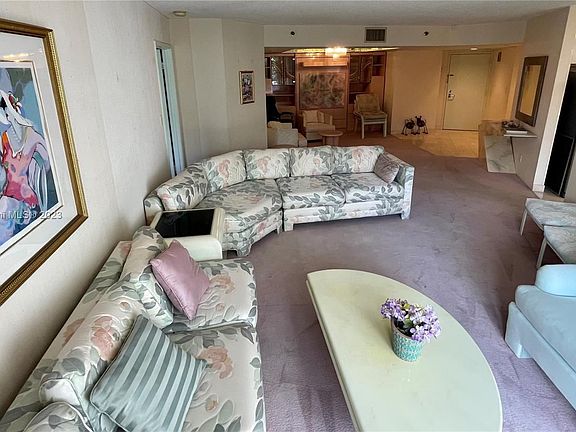3rd image of 3600 Mystic Pointe Dr APT 216