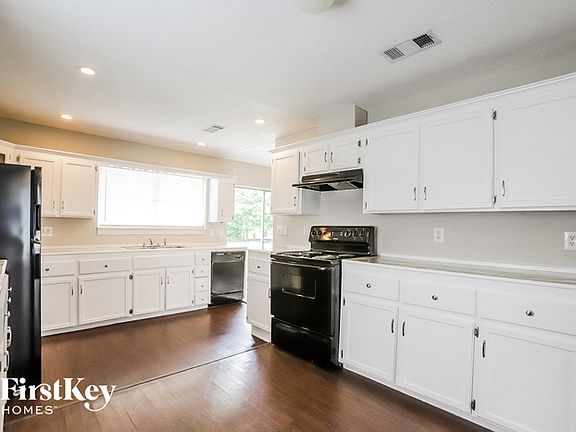 5th image of 7711 Whispering Wood Ln