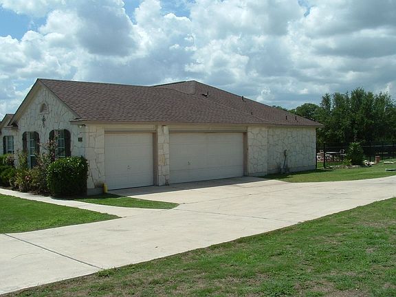 side view of the huge 3 car garage