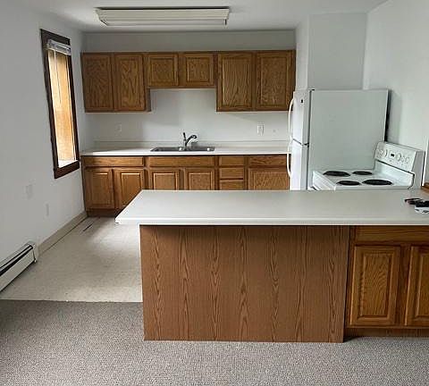 large kitchen and dining/living room area