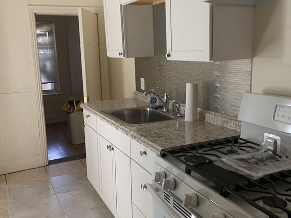 New Kitchen cabinets with pantry and new gas range