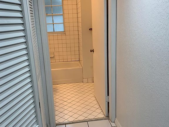 Downsrairs full bath Left laundry area