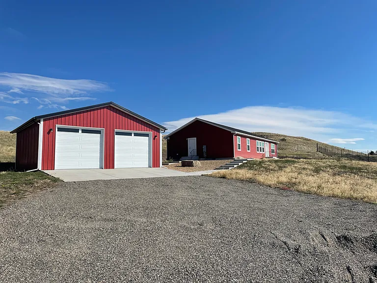 Shot from the 3.3 acre landscape surrounding this open concept country home