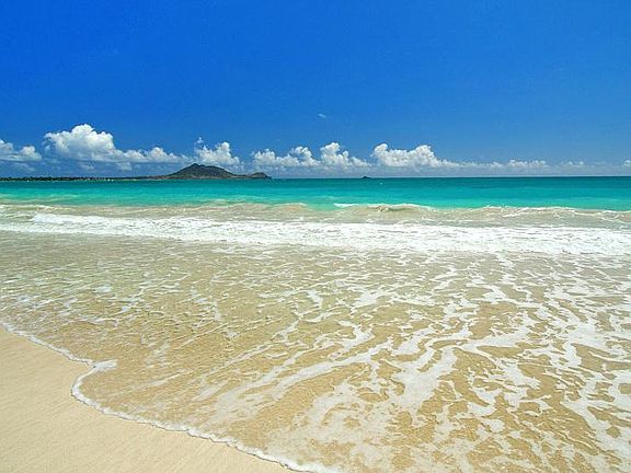 Miles of sandy beach and turquoise waters to enjoy.