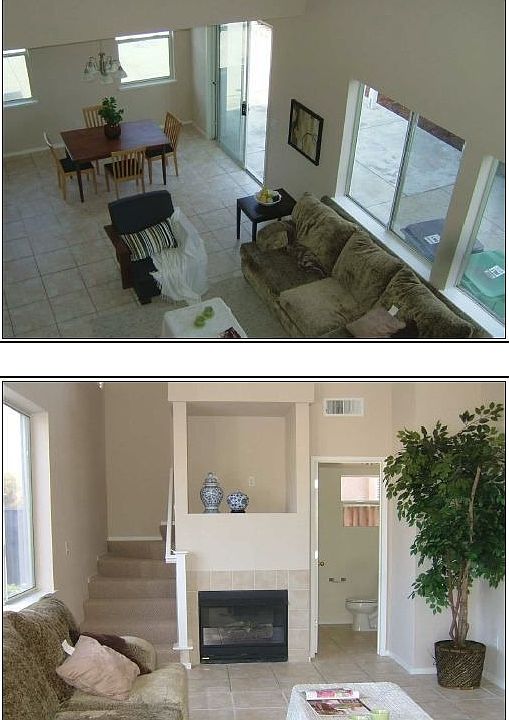 Living room and view of dining area from upstairs