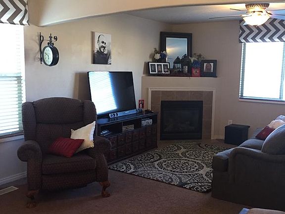 Front room open floor plan to dining and kitchen