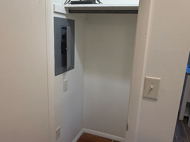 Coat Closet/Utility Closet