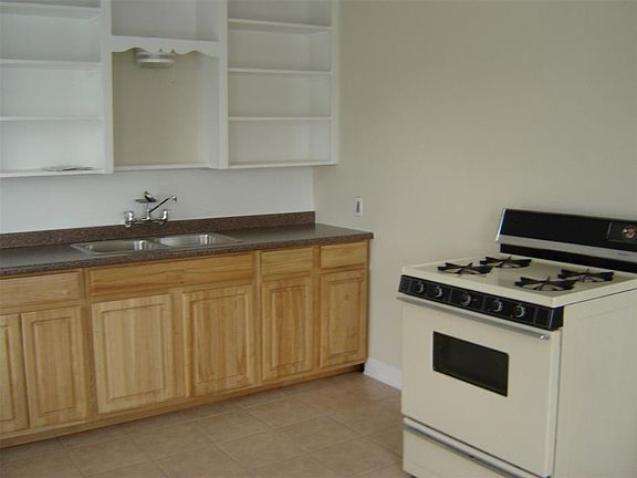 Full kitchen with a gas stove