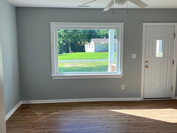 Living Room w/luxury vinyl tile and fresh paint
