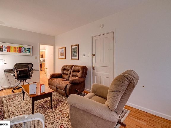Living Room with large couches and furniture for scale.