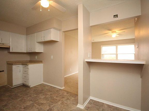 Fresh, clean, bright kitchen with plenty of storage space and lovely large dining area! (New stove and fridge installed this week!)