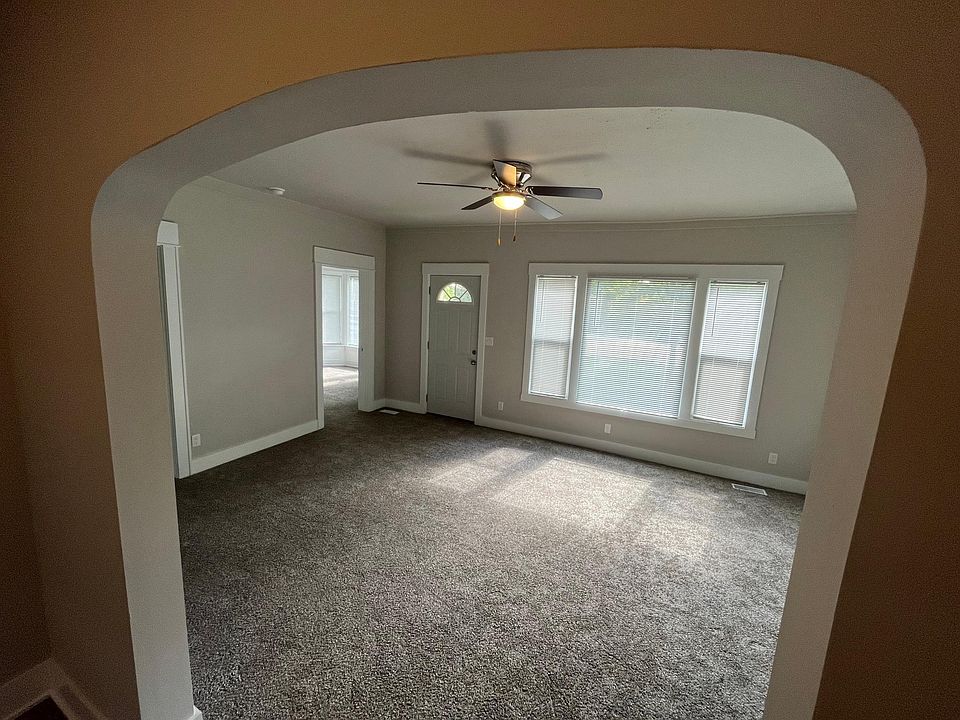 Large living room with big windows