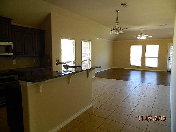 KIT. - TO - DEN OPEN FLOOR PLAN