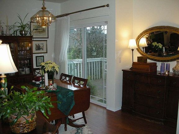 Formal dining room with deck access for view. New hardwood floors too.