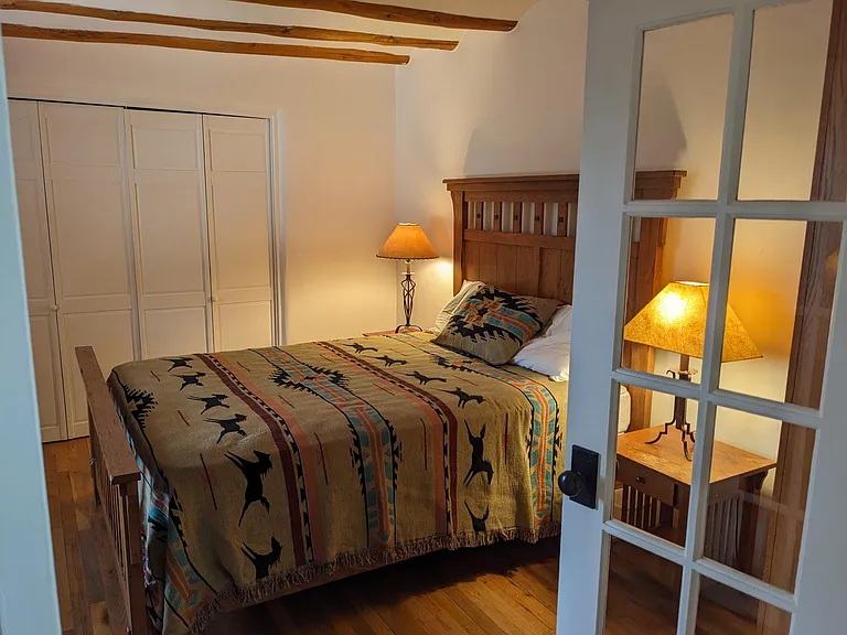 Queen bed in master bedroom