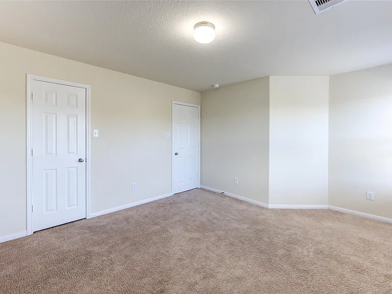 10907 Woodland Leaf Ln — Photo 18