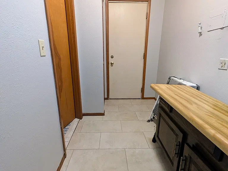 Hall to back door and bathroom