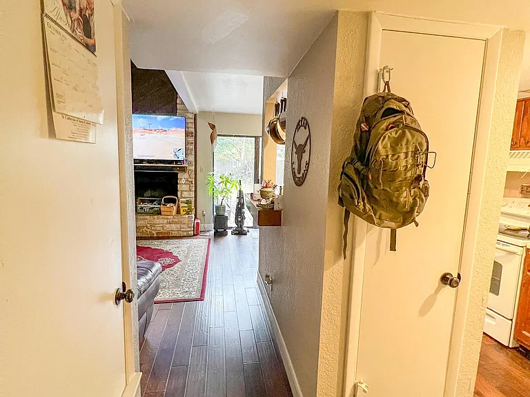 view from laundry to kitchen and living room